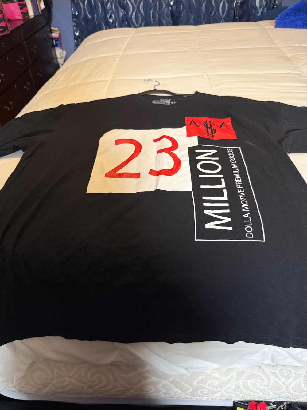 Millibon Black Tee with Red & White '23 Million' Graphic